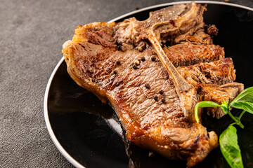 t-bone steak roast cut of meat juicy roast beef tasty snack fresh delicious gourmet food background on the table rustic food top view copy space