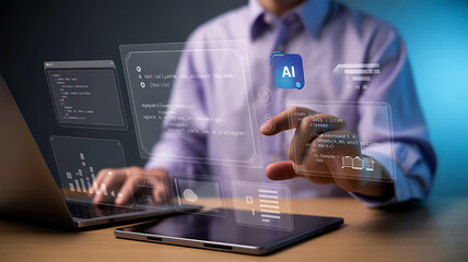 Man with robotic arm interacting with futuristic digital interface and coding on laptop