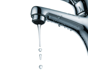 Water dripping slowly from shiny faucet isolated on a bright white background
