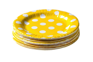 A stack of yellow disposable plates with white polka dots.  The plates are slightly corrugated, and a dozen or more are stacked in the image