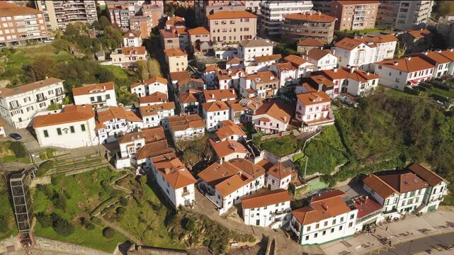 Aerial Flight Over Algorta's Historic Old Town on a Bright Day