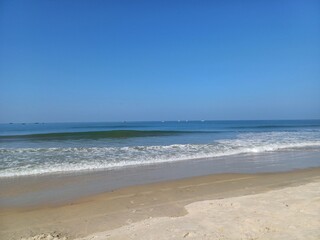 blue sky and waves on the beach, Colva Beach.