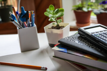 a collection of common desk and study items. back to school, study environment, college planning, or education design element.