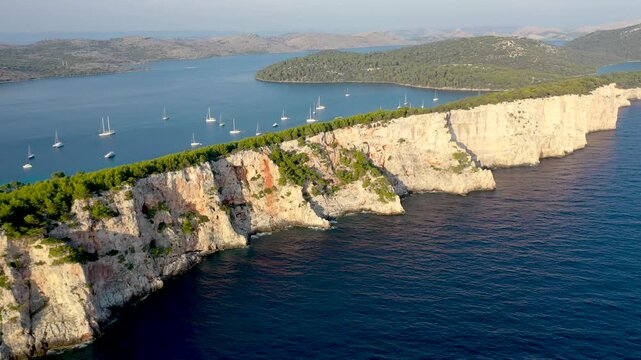 Drone of Croatias Dugi Otok Cliffs shows textured limestone and sharp edges meeting the Adriatic Sea
