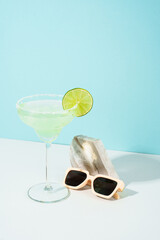 Margarita cocktail. Summer alcohol drink, sunny shadows.