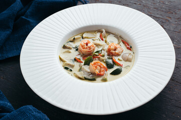 Creamy Green Thai Shrimp Curry in White Bowl