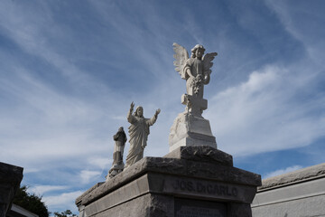 Angel and Religious Statues in New Orleans Cemetery