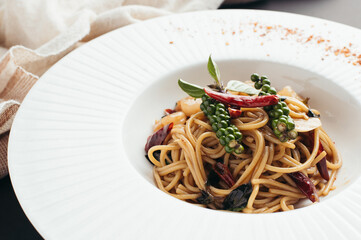 Spicy Spaghetti Dish with Chili Peppers and Basil