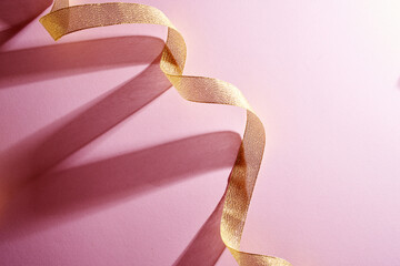 gold color ribbon with strong shadow.