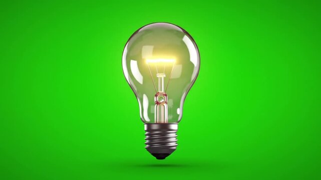 A glowing lightbulb symbolizing a new idea and innovation, isolated on a green screen background for easy keying.