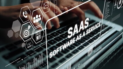 Modern Technology Concept Illustrating Software as a Service with Hands Typing on Laptop and Digital Overlay of Icons. Asymptotic smart data analytic.