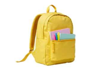 A bright yellow school backpack filled with colorful notebooks and supplies, isolated on a clean white background for education concepts.