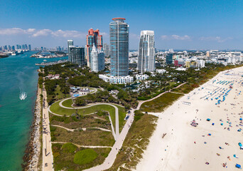Miami beach with turquoise waters. Aerial view of sandy coastline and waves. Tropical Miami Beach...