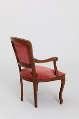 Stylish and Elegant Vintage Armchair Featuring Upholstered Luxurious Red Fabric Design
