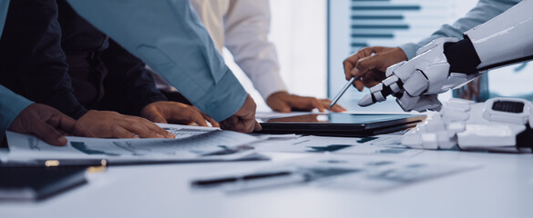 A modern office scene showcasing robotic assistance in a business meeting, emphasizing teamwork and...