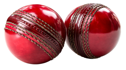 Two red cricket balls with visible stitching and seam