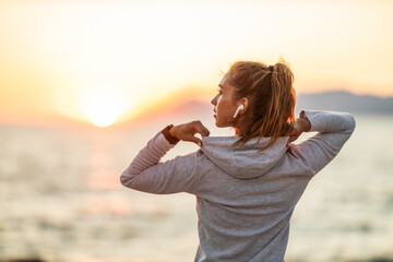 Woman Enjoying Sunset After Running