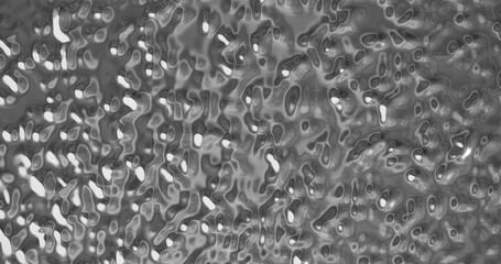 Metal frozen bubbles pop up on textured shiny surface with top light