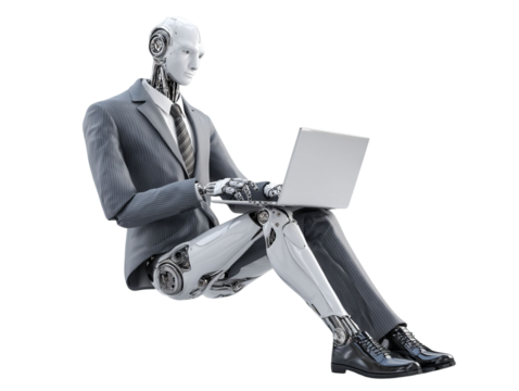 PNG of A humanoid robot in a business suit sits, using a laptop with advanced technology features.
