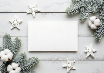 Fototapeta premium Christmas and Winter Holiday Flatlay with Festive Decorations Including Pine Branches, Stars and Cotton on White Wooden Surface with Copy Space