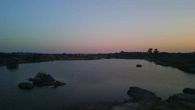 Sun Coming Up In The Morning At The Natural Park Of Barruecos In Extremadura