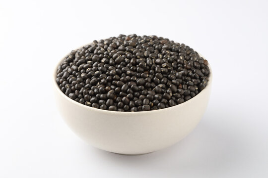 whole black urad dal, also known as black gram or urad sabut dal. Dal Makhani