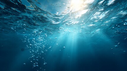 Obraz premium Underwater Scene Sunlight Streams Through Bubbles in Ocean Depths