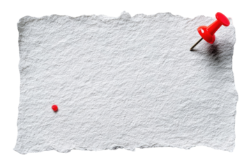 Blank, torn paper with a red pushpin