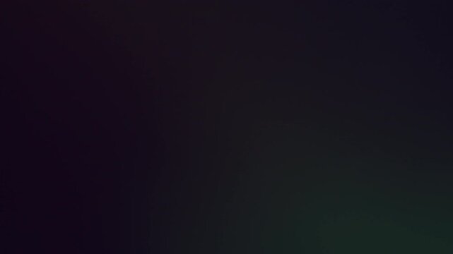 Blur luminosity. Soft light overlay. Defocused color old cinematic reflection effect. Night beam green flare motion abstract black background.