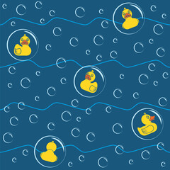 Seamless pattern with yellow toy ducks and bubbles. Colored vector background.