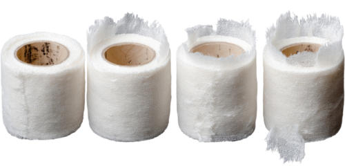 Rolled white fabric strips