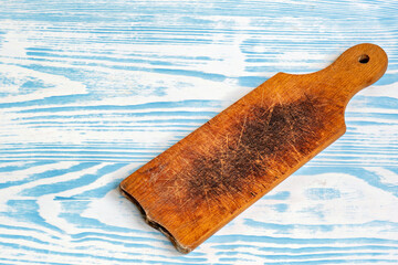 This is an image of a wooden cutting board