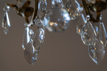 Close-up of cut crystal detail on a chandelier. 
