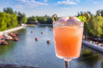 Cocktail on the rooftop terrace at the Qianhai lake in Beijing, China