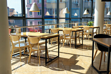 This is an image of an indoor dining area with a modern design