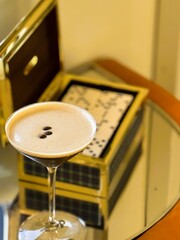 Creamy Coffee Cocktail beside Domino Game
