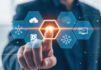 A person interacting with innovative IT digital icons, symbolizing the future of technology. A hand points toward the word IT, surrounded by hexagonal interface elements