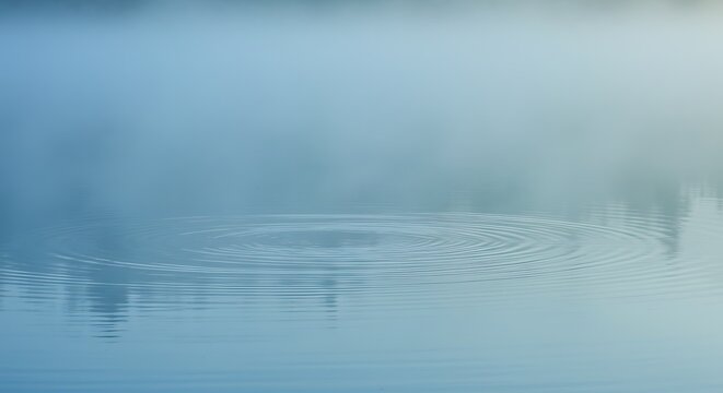 Gentle ripples on a tranquil lake, cool blue and green tones, misty