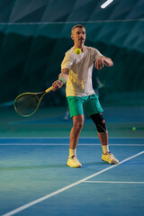 Man playing tennis on a court