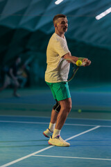 Man playing tennis on a court