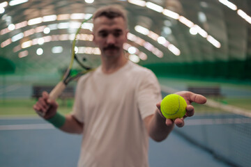 Man playing tennis on a court