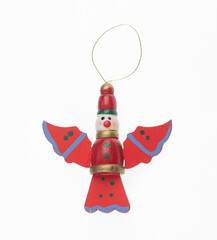 wooden christmas tree toy isolated on white background