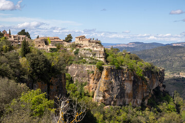 View from Siurana viewpoint over the reservoir, village, and Church of Santa Maria de Siurana in...