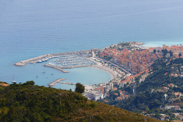 Aerial view on French Riviera, colorful Menton old city and marina on blue Mediterranean Sea near French-Italian border.