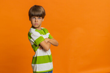 Offended sad nervous young preteen child boy kid having misunderstanding, frustrated after quarrel,...