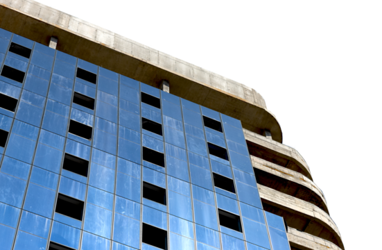 Highrise building under construction with steel framework and glass facade in modern city. Tall