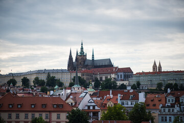 old town of prague, historic rooftops and church towers, likely in Prague's Malá Strana, Lesser...