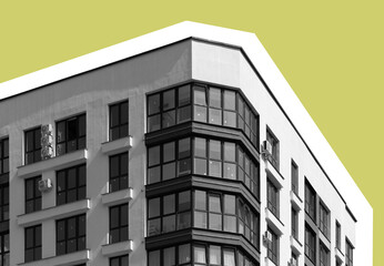 Modern residential building in developing city neighborhood. Tall condominium block with balconies