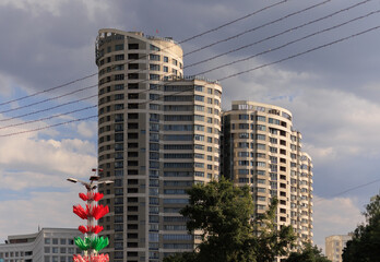 City view, modern buildings against the blue sky.