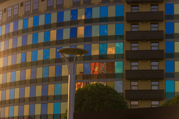 Cityscape on a summer day, modern buildings and houses 